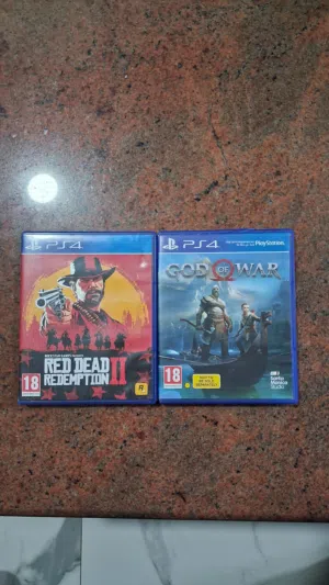 شريط ريد ديد ريدمبشن و شريط God of war بافضل حال وجيد جدا يمكن تبديل السيديات بين الطرفين...........