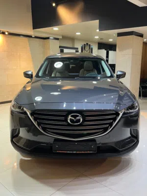 مازدا CX-9 2021 وارد وصيانه وتحت كفاله الشركه مالك اول فحص كامل فل كامل اعلى تصنيف