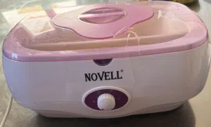 جهاز شمع البرافين NOVELL الأصلي للعلاج الطبيعي والعناية (بحالة الزيرو تماماً)