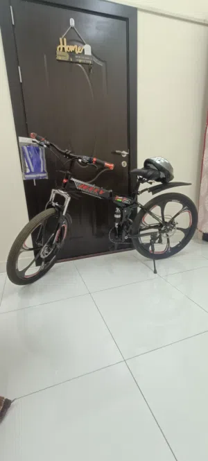 Like-New Geared Folding Bicycle with Helmet & Safety Jacket