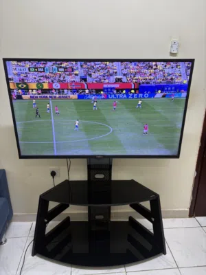 Nikai 55” 4K UHD TV + TV Unit Included