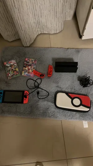 Nintendo switch console with games,controller and case CASH ONLY