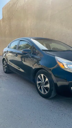 كيا ريو موديل 2015 وارد أمريكي لون اسود للبيع
