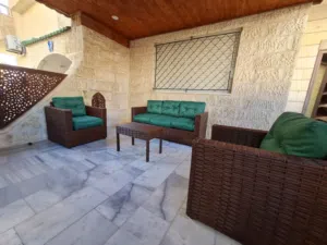 شقة ارضية للبيع في ضاحية الرشيد