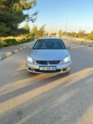 ميتسوبيشي لانسر للبيع موديل 2012 خليجية الملا 1600 اصلي فحص