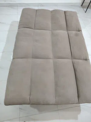 one year used sofa bed in good condition at ghubrah