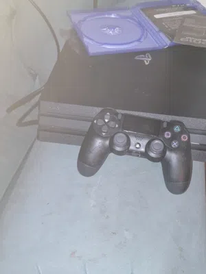 playstation 4 pro with controller and Minecraft