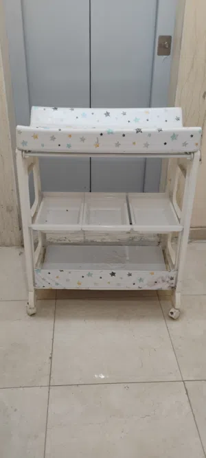 baby cleaning changing table