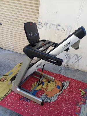 This is likely a WNQ F1-6000S commercial treadmill.   It is a motorized electric treadmill.  The tre