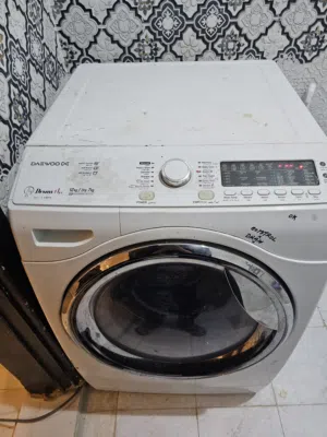 غسالة تجفيف كامل 12 غسيل و 7 تجفيف يبيلها صيانة