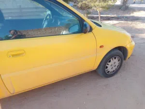 هوندا لوغو موديل 2001محرك 16ماشي 180لف كم بدون مكيف سيار جمرك قاعد استيراد سويسري