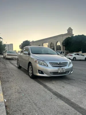 تويوتا كورولا 2010 XLI فضي مرخصة وتامة المواصفات الخليجية مع تقنيات حديثة  ملاحظه البيع بدون الرقم *