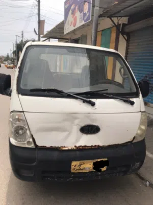 كيا بنگو 2006