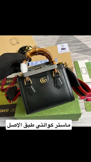 Gucci . Hand Bags . Black . New0