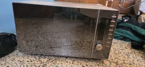 جهاز مايكرويف  الجهاز بي خلل كهربائيات يتصلح قيم  واخذ