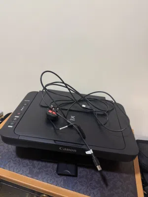 Electronics (printer, slow cooker, MacBook charger)
