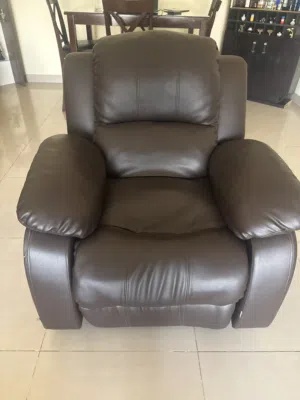 Single seater Faux leather recliner for sale in very good condition