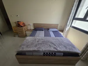 Bed with side table