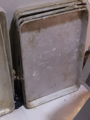 صواني  مستعملات مال دهينه بقلاوه وكنافه الوحده