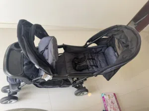 عربة اطفال توأم