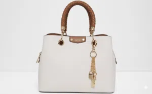 ALDO. نوع التصميم: حقيبة يد وتوت (Top Handle Satchel / Tote Bag) تأتي بلون أبيض (Off-white/Bone) مع
