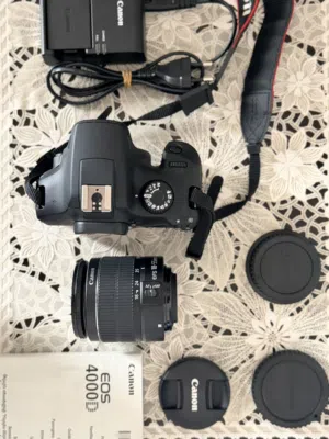 Canon EOS 4000D DSLR camera in excellent condition ready to use with very low shutter count.
