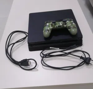 Sony PlayStation 4 Slim with controller and cables