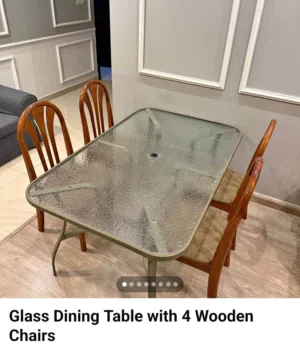 glass top dinning table with 4chairs price 300