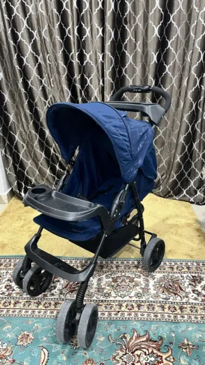 عربة طفل ماركة جونيور حالة ممتازة