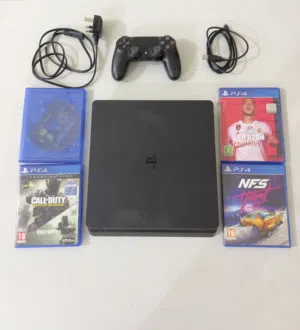 PS4 Slim 1TB + Original Controller + 4 Games  Excellent Condition