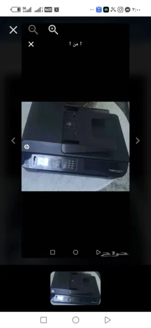 لابتوب مع قاعدة شحن مع طابعه