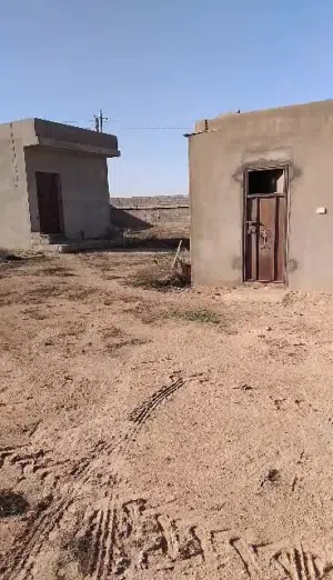قطعة أرض في ترهونة سيدي الصيد قرب معسكر الدفاع الجوي