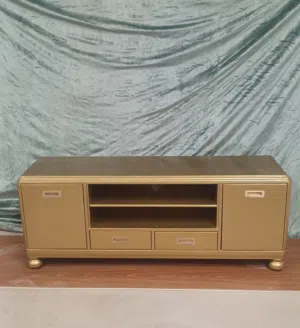 طاولة تلفزيون فاخرة لون ذهبي بحالة ممتازة Luxury Gold TV Stand – Sophistication Meets Elegance
