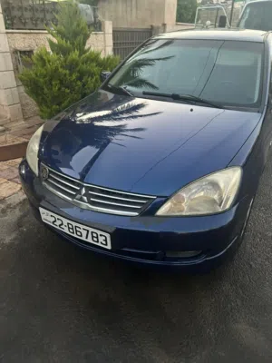 ميتسوبيشي لانسر 2014 GLX كحلي فابريكة، مرخصة ومجمركة بسعة محرك 1600cc