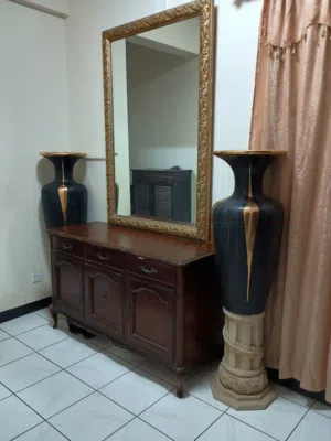 Solid wooden sideboard/console with large gold-framed mirror/Home Decor Vases