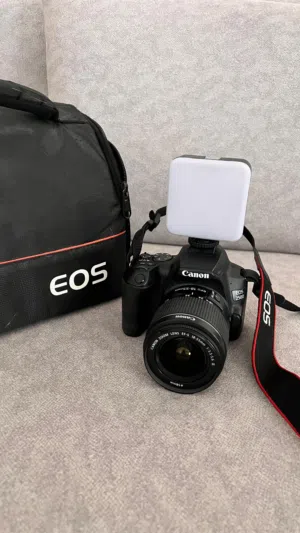 كاميرا كانون EOS 250D معها اغراضها الشنته والعدسة الكيت استخدام بسيط جدا