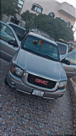 GMC Envoy جمس انفوي 2003 لون شمباني 7 ركاب فحص كامل فل كامل ما عدا الفتحة