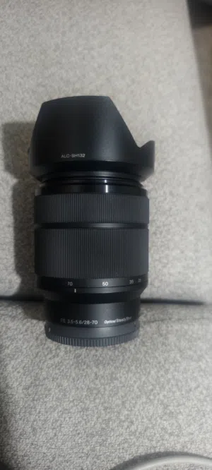 عدسه سوني  28-70 f 3.5 للبيع او البدل بعدسه كانون