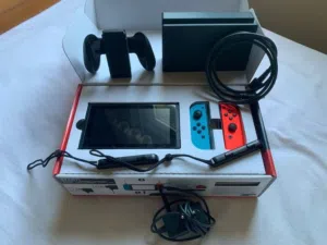 Nintendo Switch (HAC-001) Standard Size. Includes two FREE games+Case.