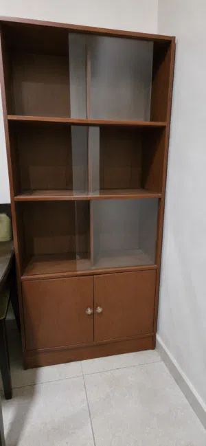 Glass-door cabinet in excellent condition for sale