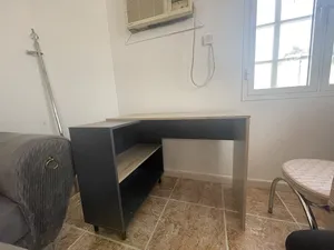 Modern L shaped desk with shelves