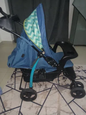 عربه أطفال مع مقعد سياره للاطفال