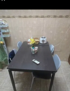 Ikea kitchen extendable table with 4 chairs.