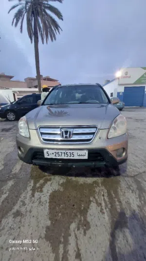 هوندا CRV 2006  محرك مغير 20 إستعمال دبي بسم الله ماشاء الله..تكيف تمام التمام..عيب السيارة سكاطلة و