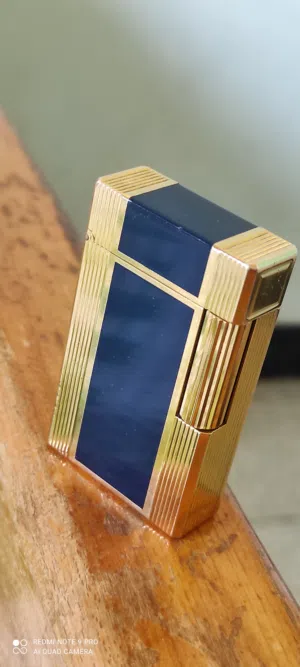 ولاعة ديبون مطلية بالذهب قطعة رائعة جدا