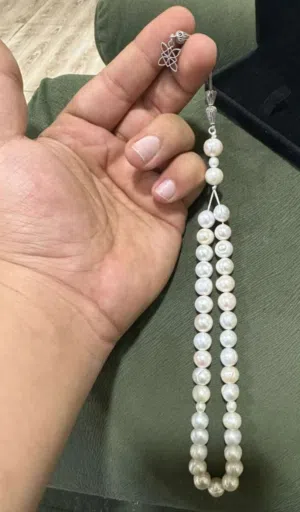 سبحه لؤلؤ طبيعي زراعي شرط الفحص كلش نضيفه   وبيهة مجال وقابل للمراوس .