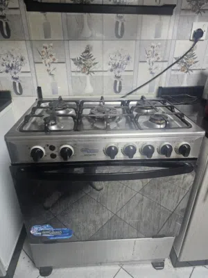 cooker 5 burner general electric  with oven  طباخ طعام 5 عيون جينيرل الكتريك مع فرن