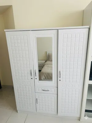 Elegant White Bedroom Wardrobe with Mirror & Unique Texture