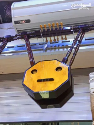 آلات موسيقية الات وترية سمسمية صناعة مصرية عود جيتار كمان اورغ طبلة دف