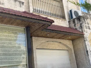 واجهة قرميد + زجاج سيكوريت
